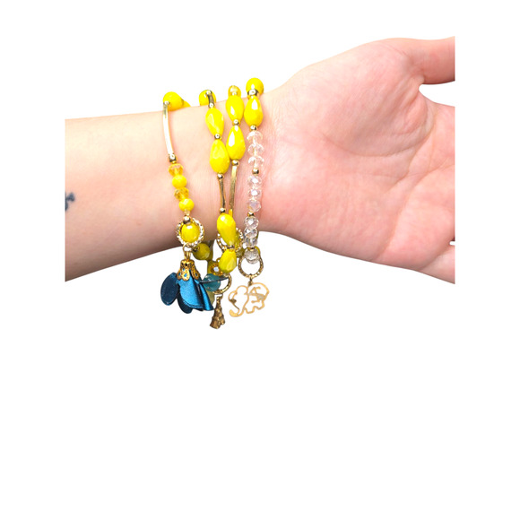 Rubylishious 
Handmade yellow Glass bead 4 piece set bracelet
One size
Has eiffe - Picture 2 of 2